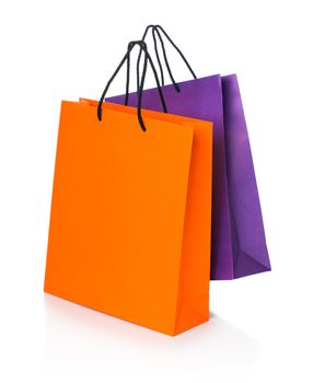 Two paper Shopping bags with reflection on white background