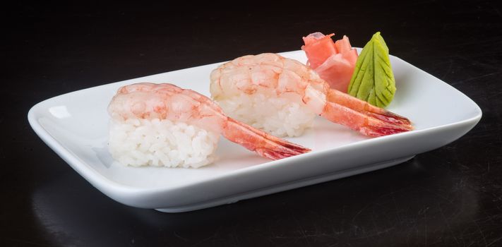 japanese cuisine. sushi shrimp on background