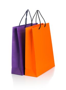 Two paper Shopping bags with reflection on white background