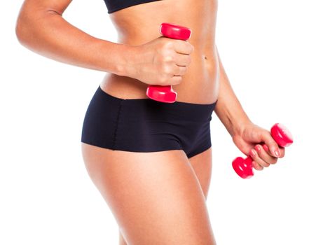 Beautiful slim woman with dumbbells, isolated on white background