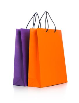 Two paper Shopping bags with reflection on white background