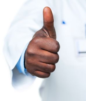 Doctor with finger up on white background