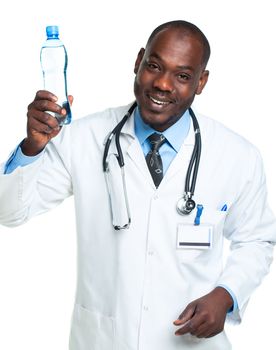 Portrait of a smiling male doctor holding bottle of water on white background