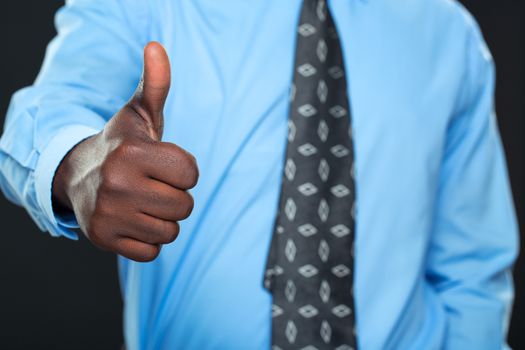 Young successful Businessman Showing Thumb Up