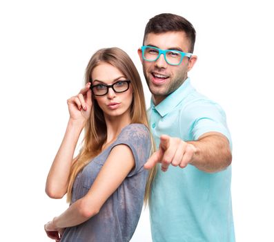 Beautiful young happy couple smiling, man and woman  looking at camera, isolated over white background