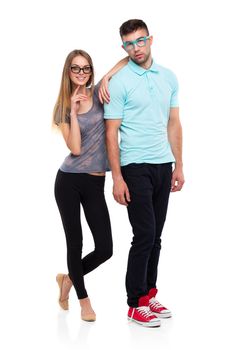 Beautiful young happy couple smiling, man and woman  looking at camera, isolated over white background