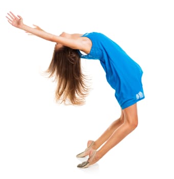 Young girl dancing in a blue dress on a white background