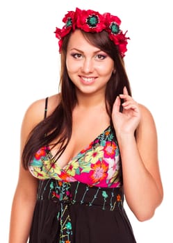 Young beautiful smiling girl in Ukrainian costume on the white background