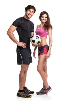 Athletic couple - man and woman with ball on the white background