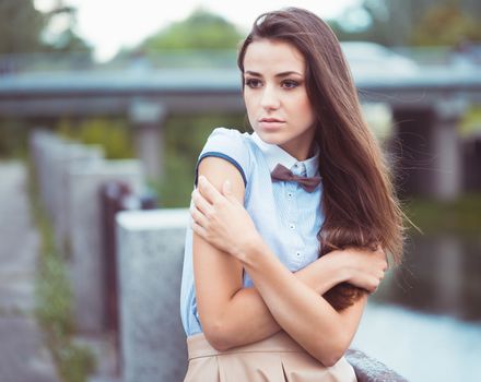 Young beautiful, elegantly dressed woman, summer and lifestyle