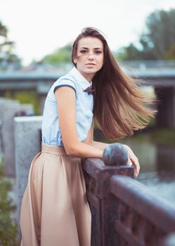 Young beautiful, elegantly dressed woman, summer and lifestyle