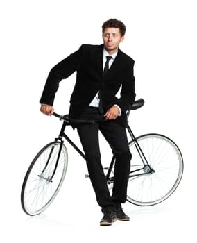 Attractive man in a classic suit with a bicycle on a white background