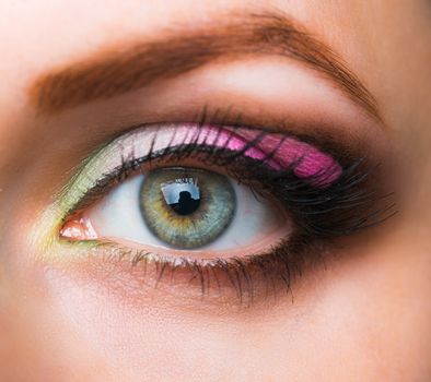 Closeup of beautiful womanish eye with glamorous makeup