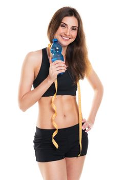 Portrait of attractive caucasian smiling woman with bottle of water isolated on white background