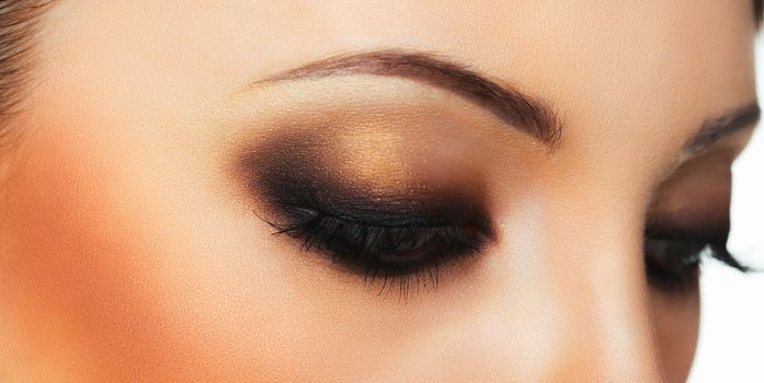 Closeup of beautiful womanish eye with makeup