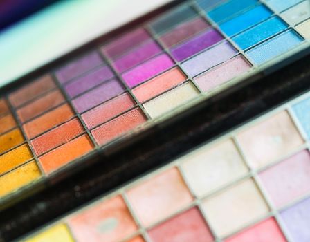 Makeup colorful eyeshadow palettes as background