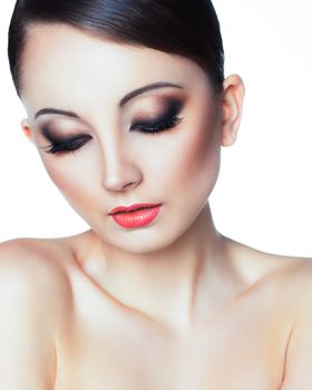 Portrait of a beautiful young woman with a glamorous retro makeup