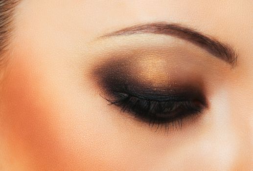 Closeup of beautiful womanish eye with makeup