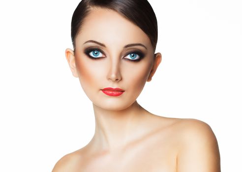 Portrait of a beautiful young woman with a glamorous retro makeup