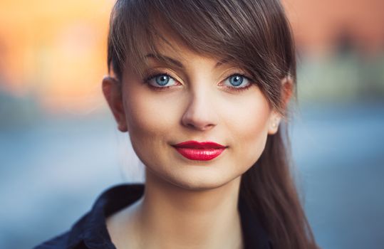 Closeup portrait of a young beautiful girl outdoor