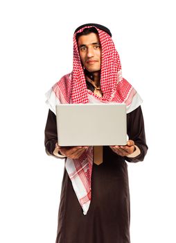 Young smiling arab with laptop isolated on white background