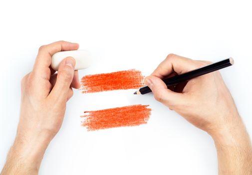 Man's hands with pencil draws flag of Austria on white background