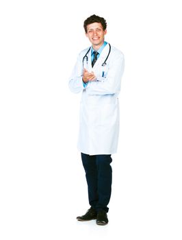 Full length portrait of the smiling doctor standing on a white background