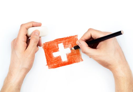 Man's hands with pencil draws flag of Switzerland on white background