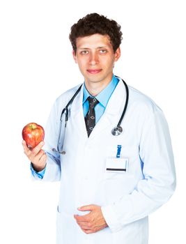 Portrait of a smiling male doctor holding red apple on white background