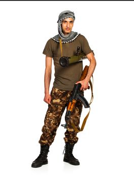 Arab nationality in camouflage suit and keffiyeh with automatic gun and launcher on white background with reflection