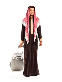 Young smiling arab with a suitcase isolated on white background