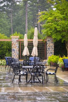 Modern set of outdoors patio furniture in a backyard