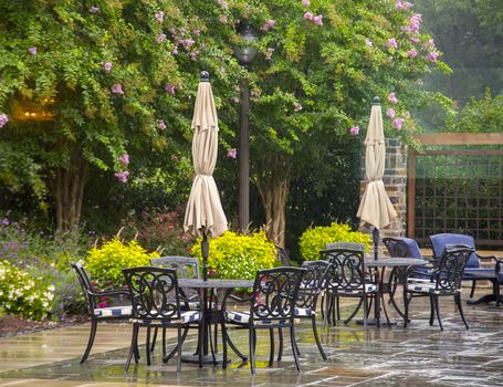 Modern set of outdoors patio furniture in a backyard