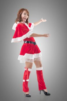 Smile happy Asian Christmas girl introduce, isolated full length portrait.