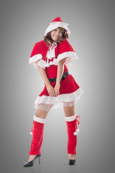 Attractive Christmas lady of Asian woman, full length portrait.