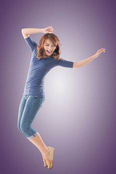 Excited Asian young girl, full length portrait isolated.