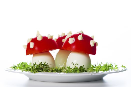 fly mushrooms made from boiled egg ,tomato and mayonnaise