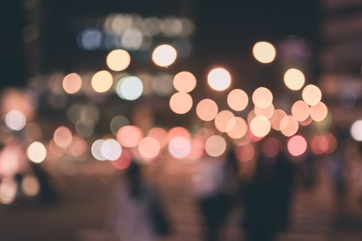 Abstract urban background with blurred buildings and street, shallow depth of focus.