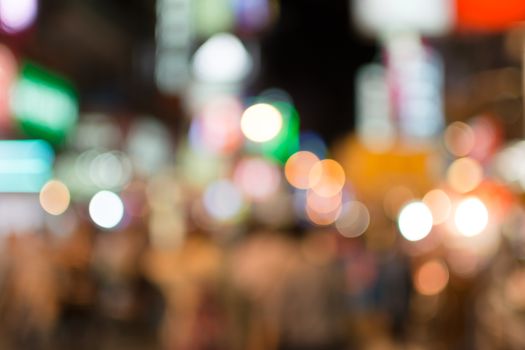 Abstract urban background with blurred buildings and street, shallow depth of focus.