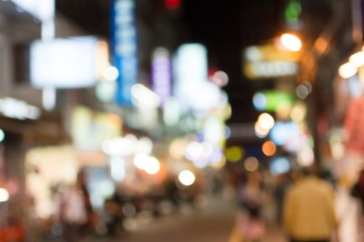 Abstract urban background with blurred buildings and street, shallow depth of focus.