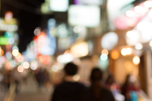 Abstract urban background with blurred buildings and street, shallow depth of focus.