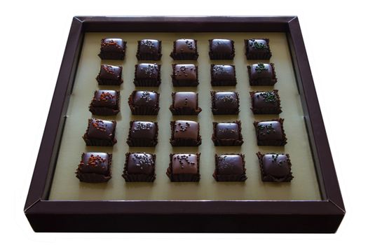 Variation of chocolate candy in the box isolated on white