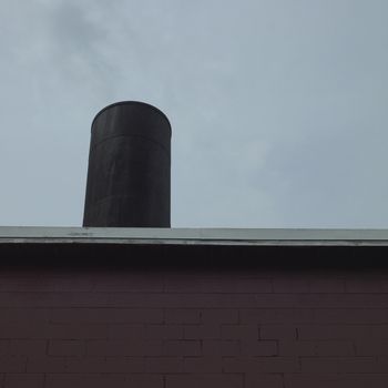 Industrial building with large chimney