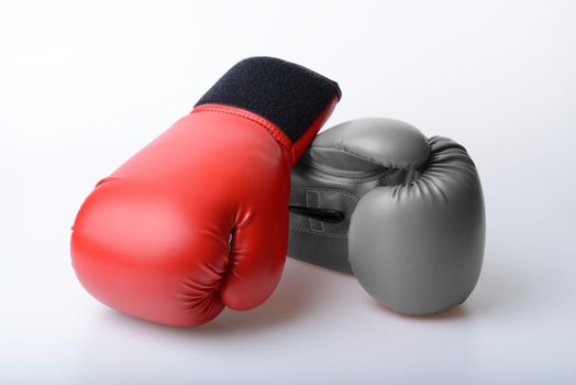 Pair of red and black and white color leather boxing gloves