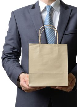 businessman hold a paper bag with both hand,business concept
