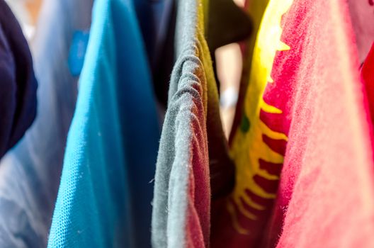 Pile of colorful laundry clothes close up