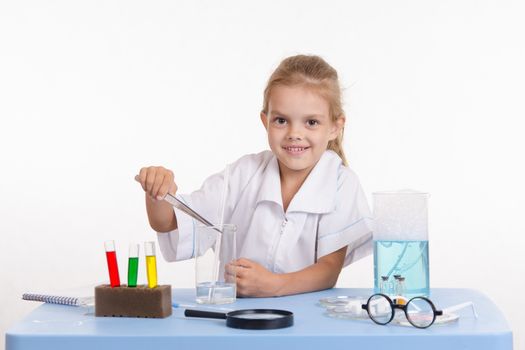Pupil at a school desk in chemistry class