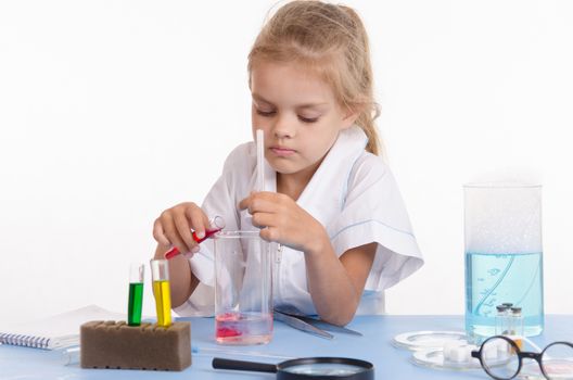 Pupil at a school desk in chemistry class