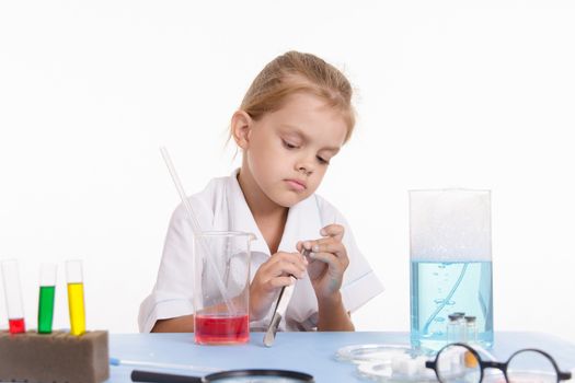 Pupil at a school desk in chemistry class