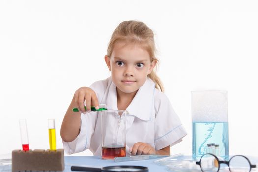 Pupil at a school desk in chemistry class